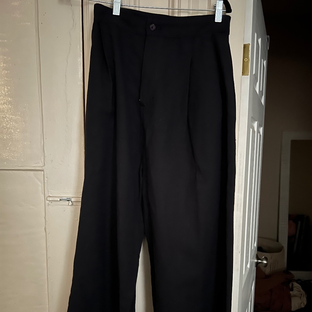 Black pleated trousers